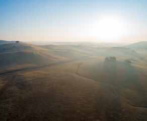  Aerial view of hazy country foothills