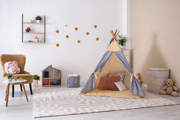 Wall Mural - Cozy kids room interior with play tent and toys