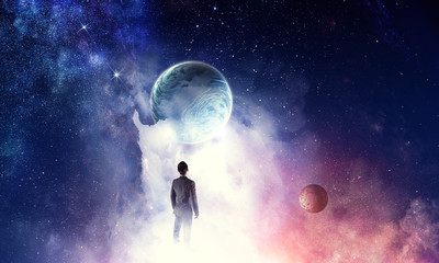 Wall Mural - businessman and cosmos concept