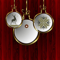 Christmas red design with abstract images of balls with a gold border and silhouettes of deer and snowflakes.