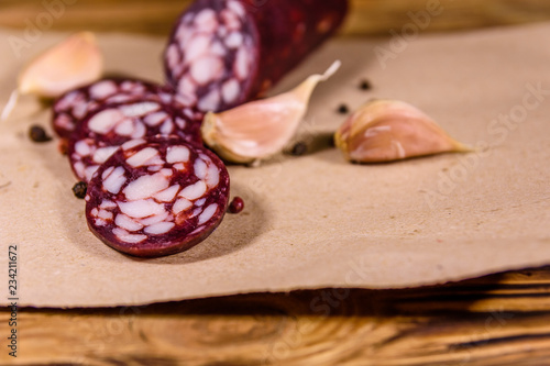 Download Sliced Salami Sausage And Garlic On A Brown Wrapping Paper Buy This Stock Photo And Explore Similar Images At Adobe Stock Adobe Stock Yellowimages Mockups
