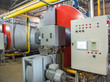 © warloka79 - modern industrial boiler room with compressor equipment. control panel