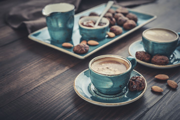 Two cup of coffee and with chocolate cookies