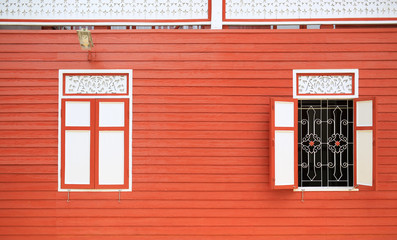 Canvas Print - Retro style wall wood plank house with close and open windows.