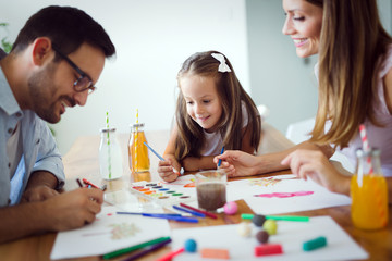 Wall Mural - Happy family having fun time at home