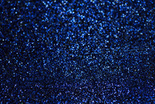 Blurred Shiny Navy Blue Background With Sparkling Lights.