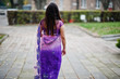© AS Photo Family - Indian hindu girl at traditional violet saree posed at autumn street.
