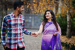 © AS Photo Family - Stylish indian hindu couple posed on street.