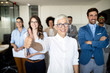 © NDABCREATIVITY - Successful business group of people at work in office