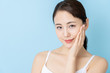 © taka - attractive asian woman beauty image on blue background
