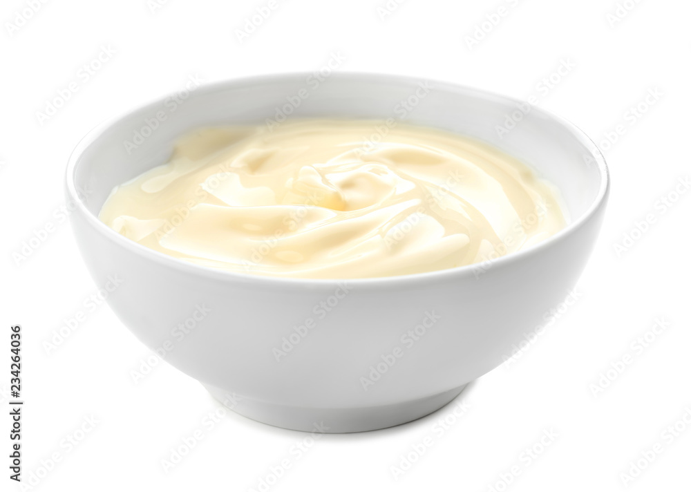 Tasty sauce in bowl on white background