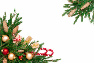 christmas frame composition with gift box, pine cones, fir tree branches, isolated. flat lay, top vi
