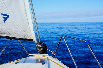 calm see and beautiful seascape from a sailboat while crossing the english channel