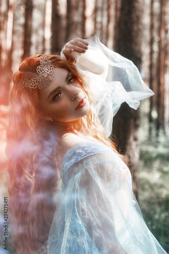 Beautiful Redhead Woman Forest Nymph In A Blue Transparent Light
