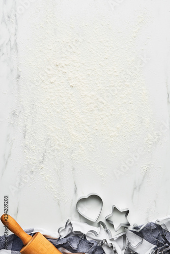 Baking Background For Christmas Cookies With Cutters And Baking Background For Christmas Cookies With Cutters And Rolling Pin On White Marble Table Flour Top View Copy E Text