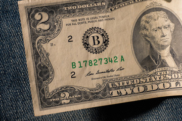 The front of a two dollar bill,