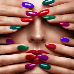 Sticker - Beautiful girl with a classic make-up and multi-colored nails. Manicure design. Beauty face.