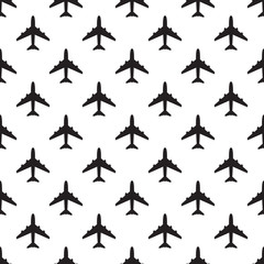 Wall Mural - Vector seamless pattern of black airplane silhouettes.