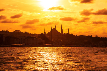 Wall Mural - Silhouette of a Suleymaniye mosque at sunset.