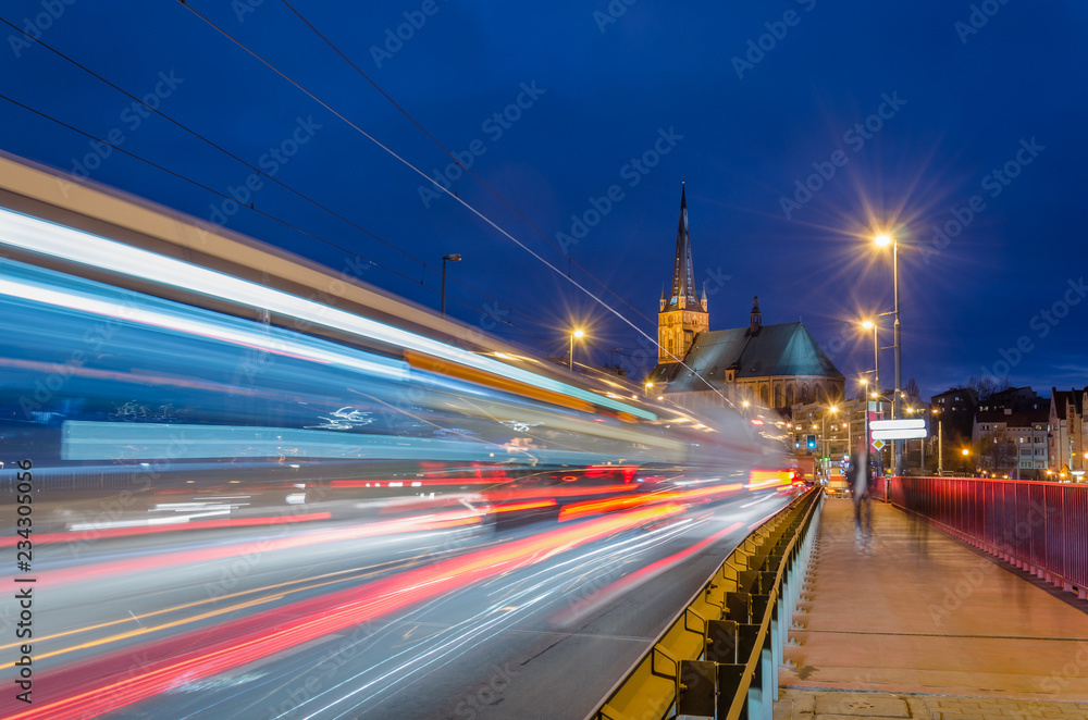 Obraz na płótnie CITYSCAPE - Urban traffic at night on the bridge in Szczecin
 w salonie