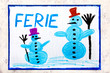 Colorful drawing of the page: Two smiling snowmans and the Polish word WINTER VACATION