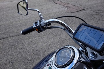 motorcycle handlebeg with cell phone holder