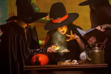 Picture Of Three Witches In Hats Cooking Poison On Cauldron