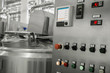 © warloka79 - electronic control panel and tank at a milk factory. equipment at the dairy plant