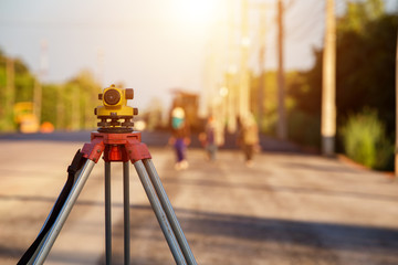 Theodolite excavator survey road construction site