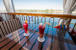 Seating on the sundeck of a river cruise boat with cocktails