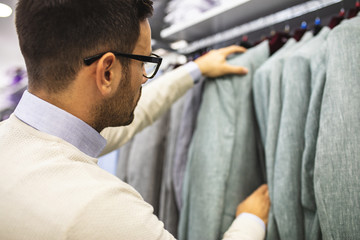 Smiling Young Man in the Shopping