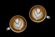 Coffee latte art isolated on black background.
