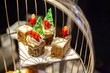 Assortment of tasty, delicious fruitcake with icing frosting decoration in Christmas theme. Perfect for afternoon tea or high tea party, Xmas, New Year celebration. Festive holiday and season greeting