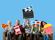 © Rawpixel.com - Group of diverse friends holding movie emoticons