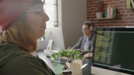 portrait caucasian woman programmer coding network security software for startup company professional web developer smiling enjoying typing code on computer screen in successful office 