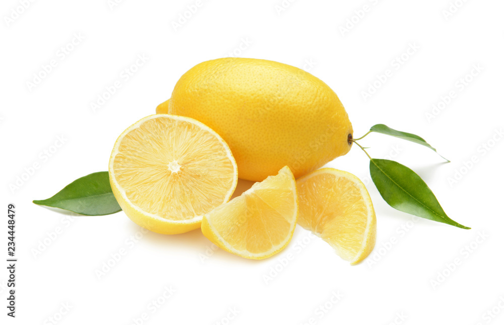 Whole and cut lemons on white background