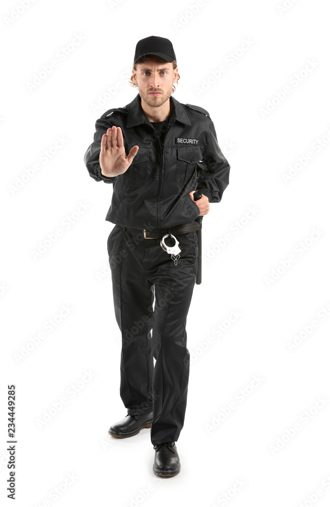 Male security guard showing Stop gesture on white background