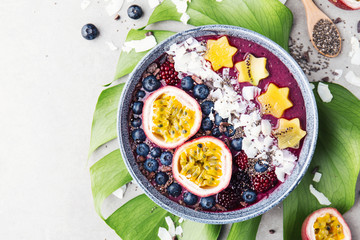 Wall Mural - Smoothie acai bowl served in bowl on grey table