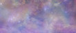 Angelic Ethereal Starry Night Sky Background -  Pink and purple coloured deep space banner background  with many different stars, planets and cloud formations
