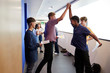 © Monkey Business - Excited Male Teenage High School Students Celebrating Exam Results In School Corridor