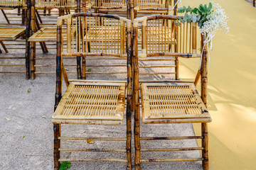 Wall Mural - Comfortable chairs made with wooden sticks during an event