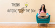 © Tierney - Think outside the box with young woman using a laptop computer