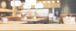 Wood table top with abstract blurred cafe restaurant with bokeh lights defocused background