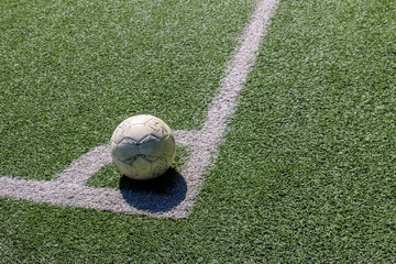 Wall Mural - Football on artificial turf. It is for green background in a stadium