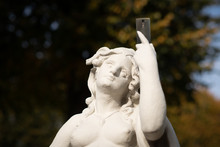 Statue Taking A Selfie
