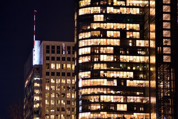 Modern office building at night. Night lights, city office building downtown, cityscape view