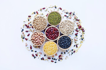 Wall Mural - Different legumes isolated on white background.