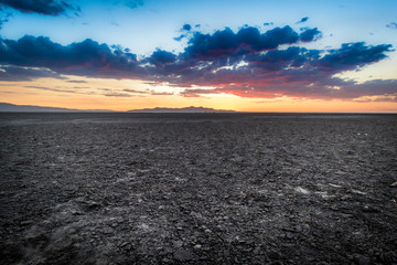 Wall Mural - Colorful Sunset Over Rocky Flat Desert