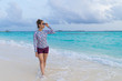 © mikumistock - Asian beautiful woman enjoyful traveling sea background.