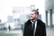 © yurolaitsalbert - young businessman on the street of a big city